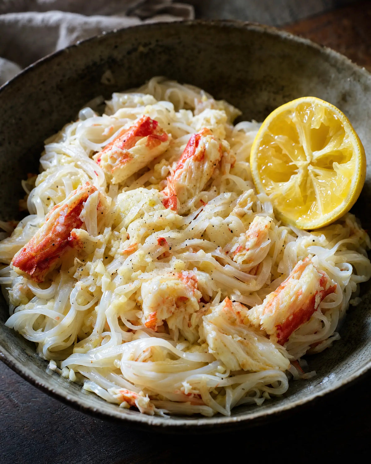 Crab Butter Rice Noodles — Crab meat tossed through buttered white rice noodles with garlic and a hard sque...