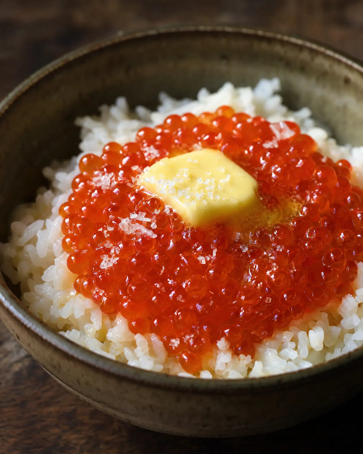 Salmon Roe over White Rice — A small tin of salmon roe over warm white rice with butter and salt...