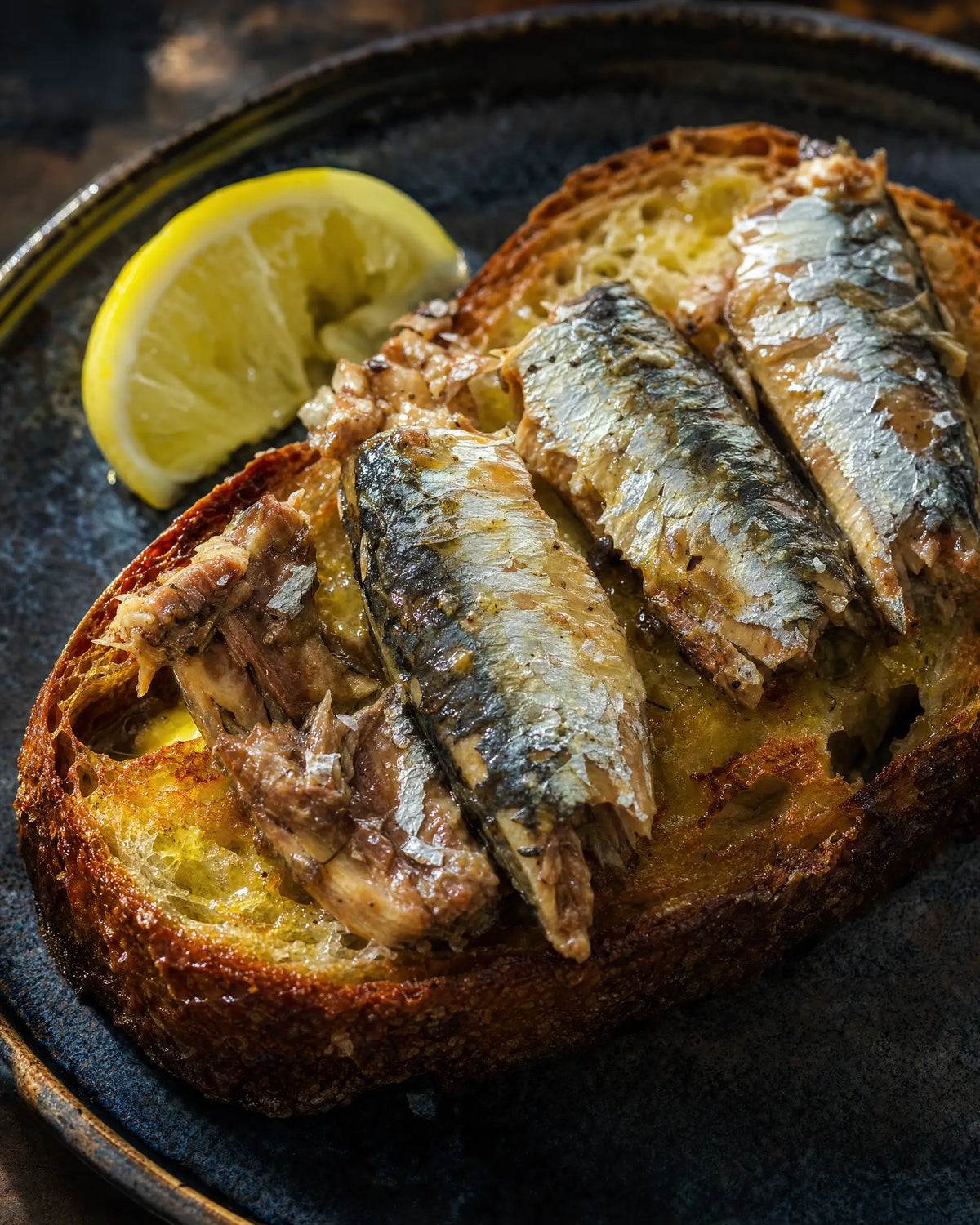 Sardines on Sourdough Toast — Tinned sardines, butter-fried toast, a squeeze of lemon...