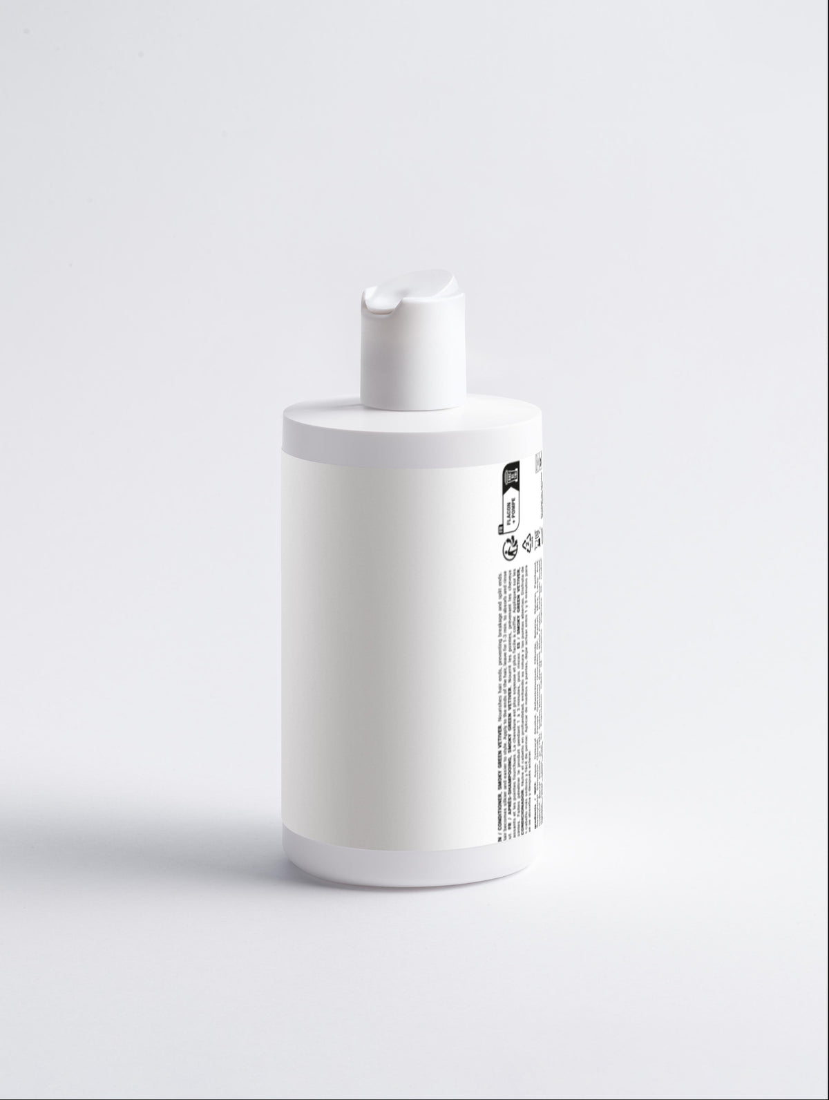 White bottle with a pump on a light gray background