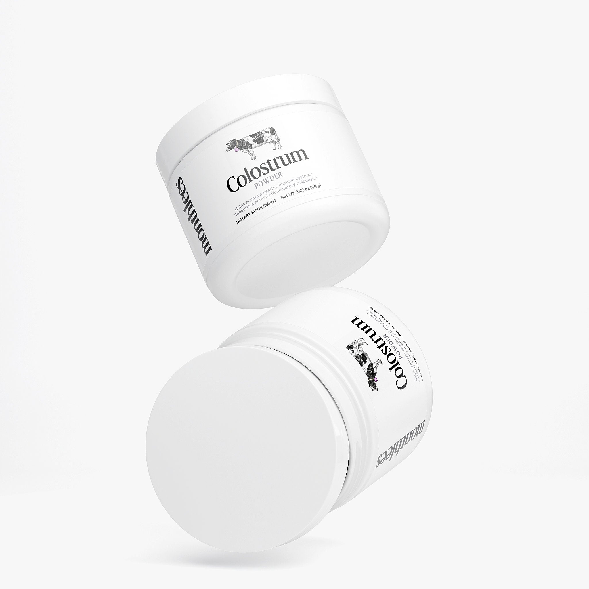 Two white containers labeled 'Colostrum' on a light gray background