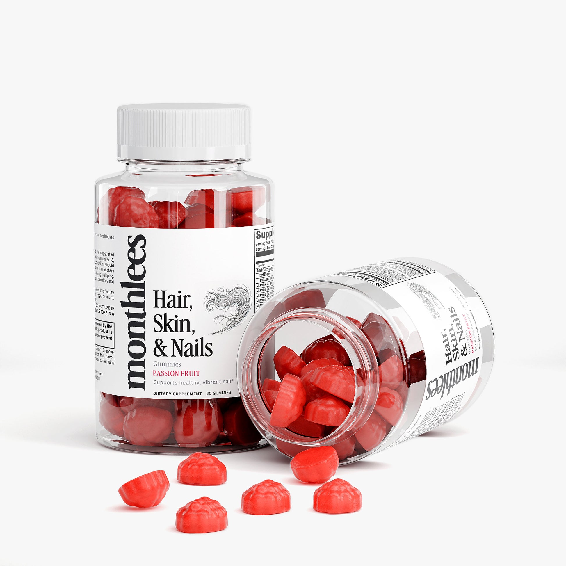 Bottle of Monthless hair, skin, and nails supplements with gummy vitamins on a white background