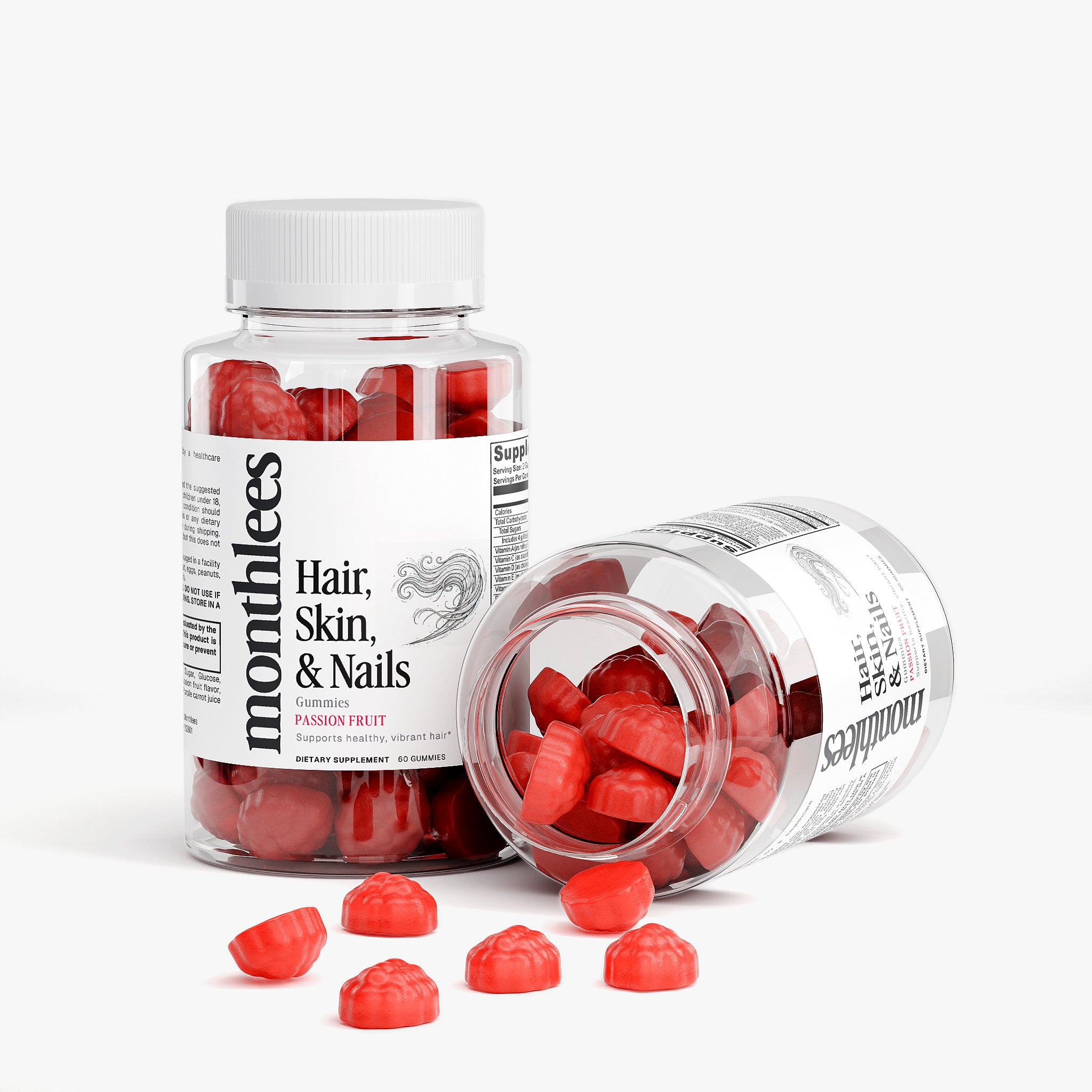 Bottle of Monthless hair, skin, and nails supplements with gummy vitamins on a white background